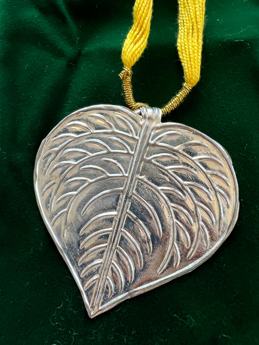 Silver Leaf Pendant on yellow string